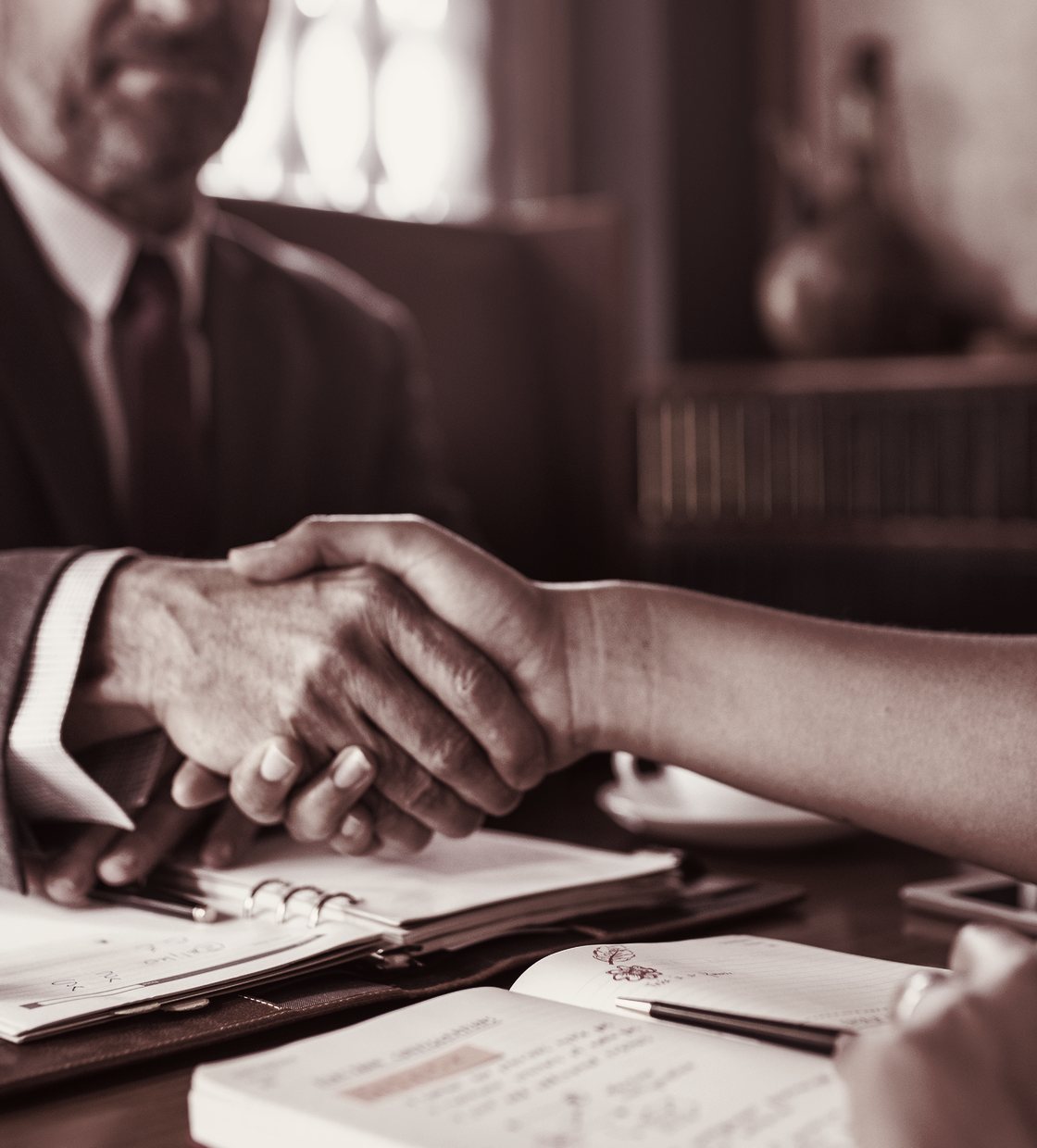 Attorney meeting with a client at the firm&rsquo;s Broadway office